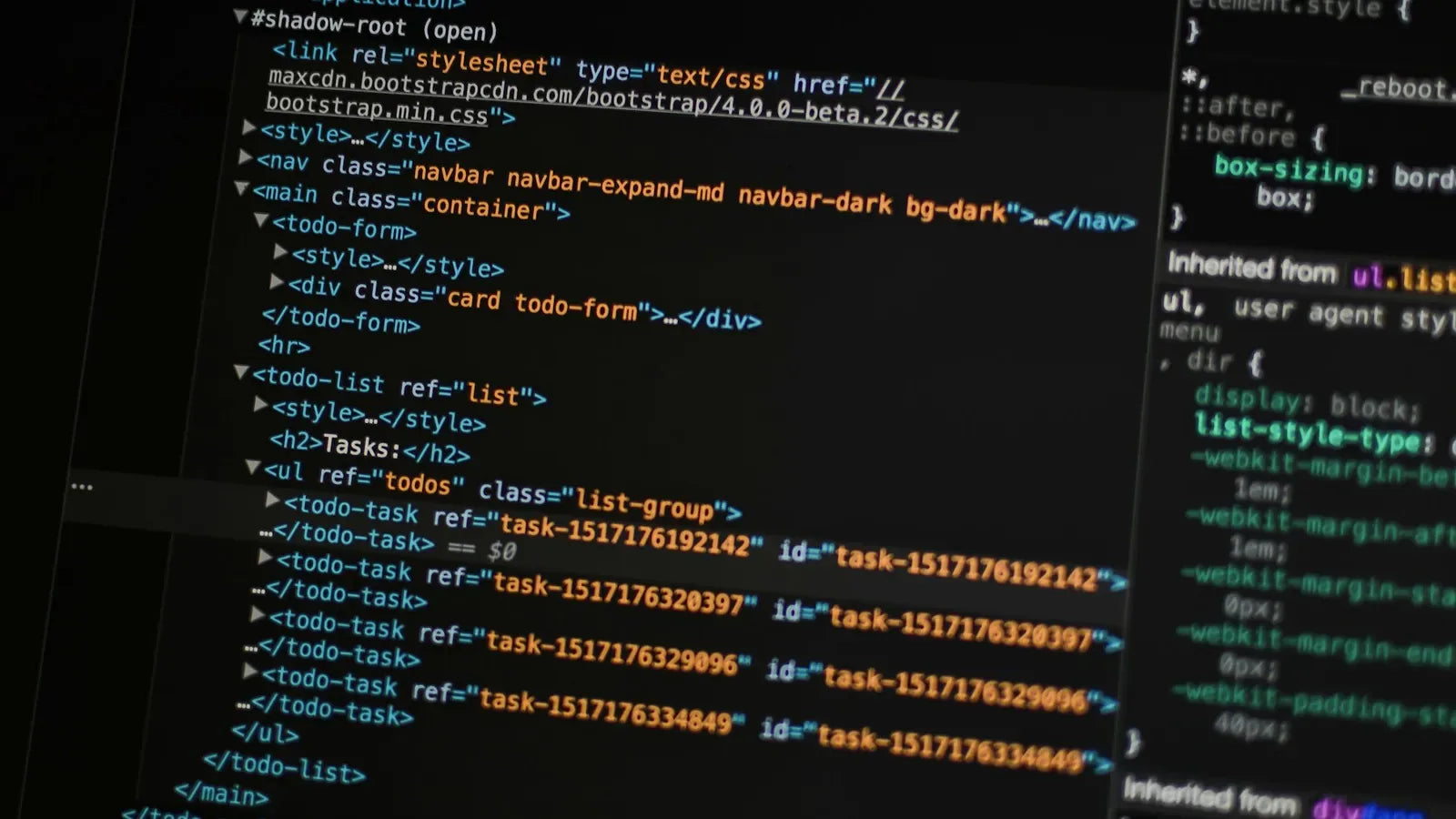 Turned on monitor displaying programming language.
