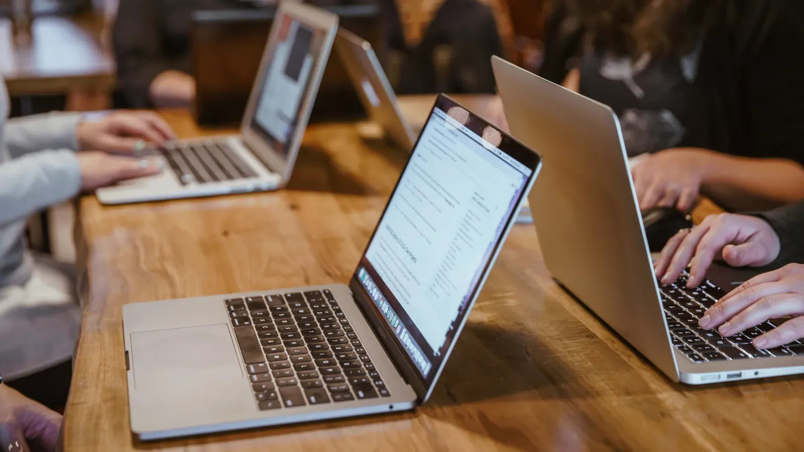 Laptops At Workstations Coding.