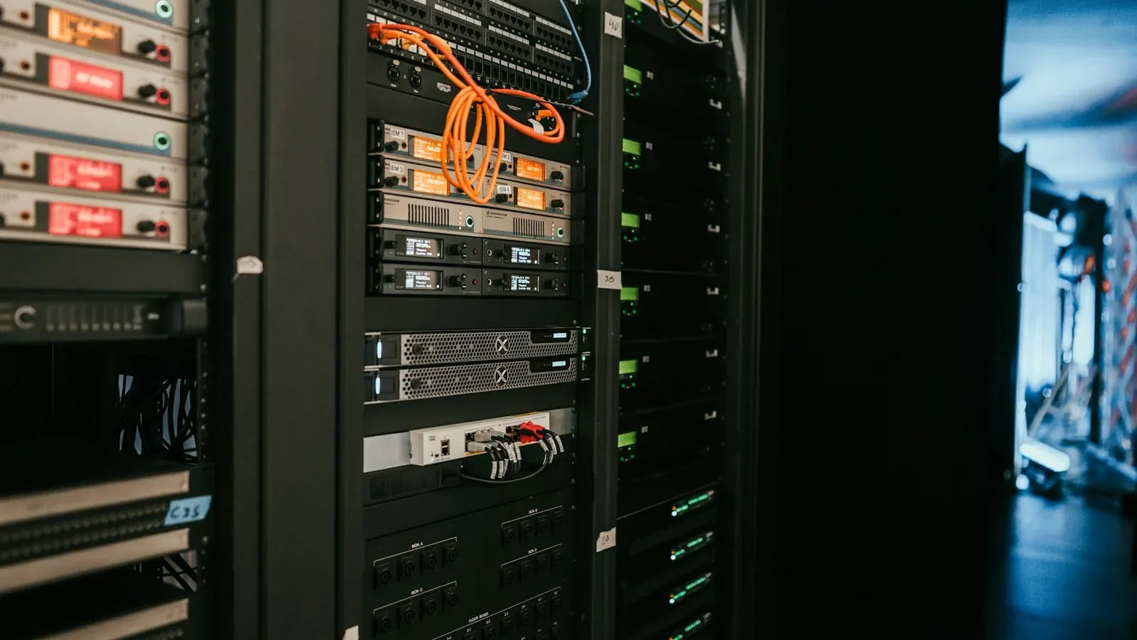 A rack of servers in a server room.