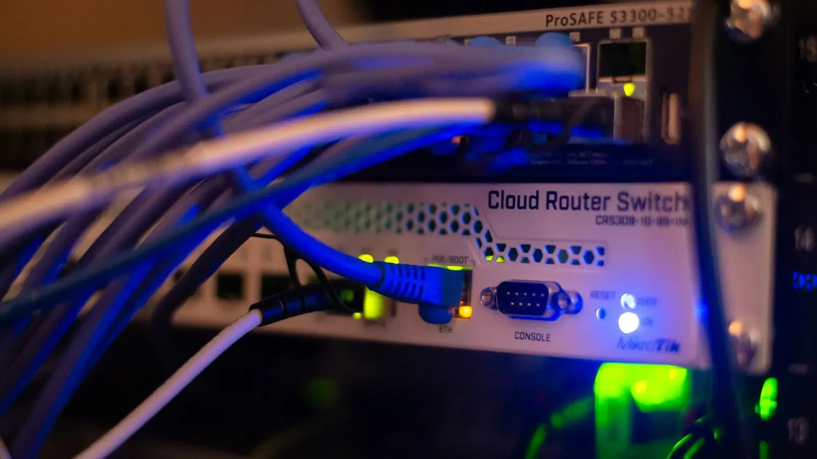 A close up of a network with wires connected to it.